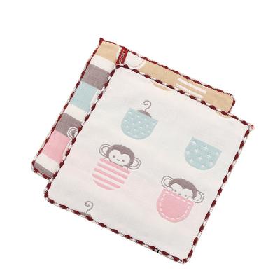 China Comfortable child's wash cloth six layer gauze absorbent babyshark face saliva lace monkey baby yoda hanging square towel for sale