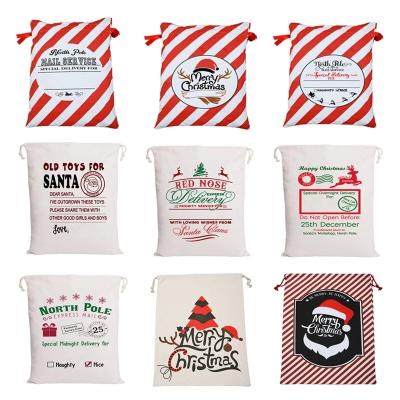 China Personalized Santa Sacks Cotton Canvas Party Drawstring Eco-Friendly Handsome Christmas Gift Red Drawstring Bag for sale