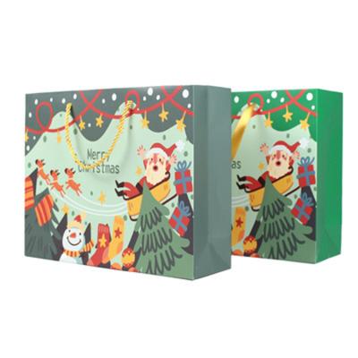 China Custom Recycled Materials Logo Christmas Design Paper Bags Recycled Gift Cheap Craft Paper Shopping Bag Te koop