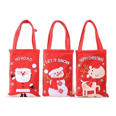 China 2021 Fashion Style Christmas Eco-friendly Snowman Printing Cartoon Children's Gift Small Candy Cotton Portable Canvas Tote Bag Te koop