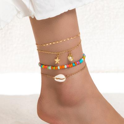 China BOHEMIA 4PCS Wind Rope Shell Rice Bead Alloy Anklet Braided Bracelet Bohemian National Color Beach for sale