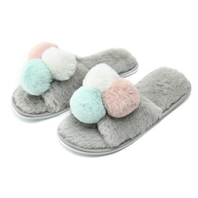 China Custom Made Women's Fashion Trend Rabbit Fur Pom Pom Ball Slide Ladies Fuzzy Fur Indoor Outdoor Soft Fluffy Slippers For Women for sale