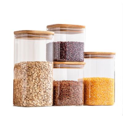 China Small Clear Borosilicate Canister Set 4pcs Square Food Microwavable Storage Jars Airtight Jars With Bamboo Lid For Pasta for sale