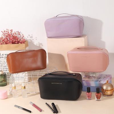 China Fashion Pillow Makeup Bag InsPremium Sense Net Celebrity Cosmetics Storage Bag Travel Convenience PU Women's Floor Wash Bag Style New for sale