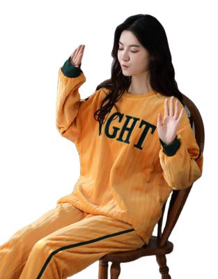 China Christmas Popular Cartoon Thermal Holiday Women Pajamas Sleepwear Set Cute Comfy Orange for sale