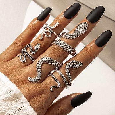 China Bestselling Punk Rock Personalized Animal Men Snake Exaggerated Black Open Rings 4Pcs Set Silver Gold for sale