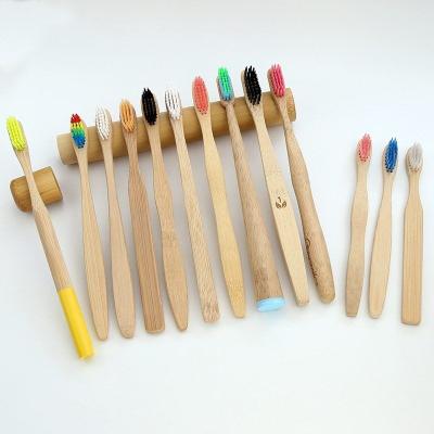 China Hotel Toothbrush Biodegradable Natural Charcoal Black Bamboo Toothbrushes With Nylon Bristles BPA Free Multicolor for sale