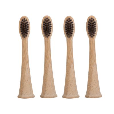 China Wholesale Logo Replacement Electric Toothbrush Heads Custom Hotel Charcoal Bristle for sale