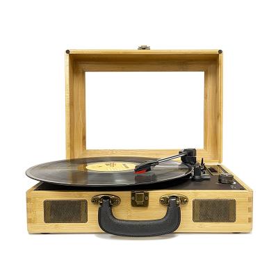 China Player to. Home Entertainment Portable High End Suitcase Multimedia 3 Speeds Retro Usb Tf Bluetooth Vinyl Record Turntable Belt Driven Natural Bamboo for sale