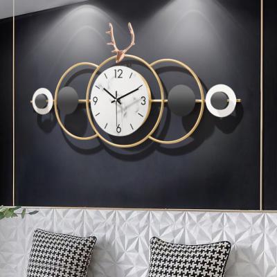 China Wall clock light luxury personality fashion living room wall clock simple wall mounted hanging clock creative silent mute eco-friendly wholesale for sale