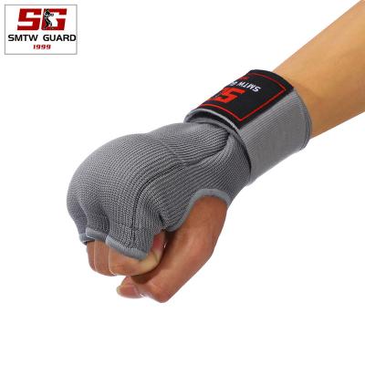 China Ideal For Boxing Training Hot Selling Nylon Gel Padded Inner Glove Fist Protector Bands Hand Wrap Boxing Training Glove for sale