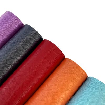 China Anti-rust Bright Color Lightly Embossed Eco-friendly Soft Faux PU Fabric Spunlace Leather Back For Decorative Shoe Wallpaper for sale