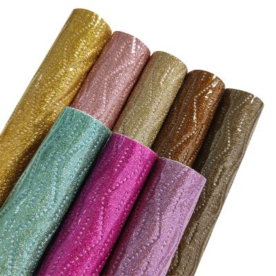 China Waterproof Fine Glitter Glossy Wave Embossed Vinyl Reflective Synthetic Leather Fabric PVC Nonwoven Backing For Bags Sofa Making for sale