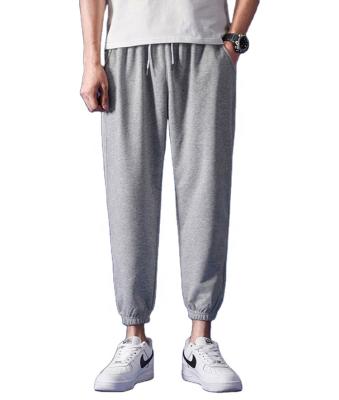 China Anti-pilling Men's Oversized White Sports Jogger Gym Jogger Elastic Comfortable Pants With Pocket Wholesale for sale