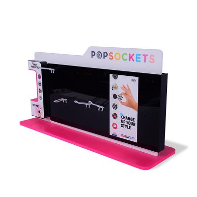 China Modern Customized Acrylic Counter Display For Mobile Phone Socket Display Accessories Display Stand for sale