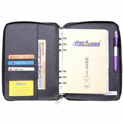 China Multi Function Logo Embossed Leather Organizer Planner Notebook With Metal Zipper for sale