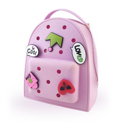 China Cute Donut Backpack Kindergarten Kids Waterproof New Schoolbag Cartoon Boys And Girls Light Rainbow Creative Backpack for sale