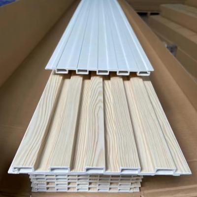 China Eco-friendly waterproof wood grain wpc fluted panel interior decoration wall panel wpc fassade wall panel for sale