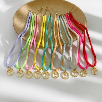 China Hollow face charm soft pottery beaded handmade vinyl disc hollow soft pottery charm choker necklaces N0139 candy color polymer clay bead necklace boho face beaded neckerchief necklaces for sale