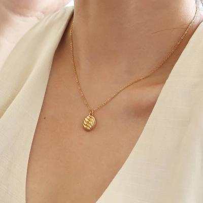 China Trendy Minimalist Thin Pendant Necklaces N0533 Thin Bread Chain Necklace Titanium Steel Layered Gold Plated Crescent Bread Pendant Necklaces For Women for sale