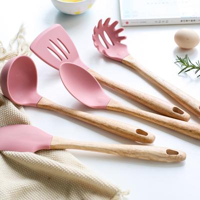 China Kitchen Viable Accessories Wood Handle Non Stick Silicone Utensils Kitchenware Silicone Utensils Set With Handheld Turner Spatula for sale