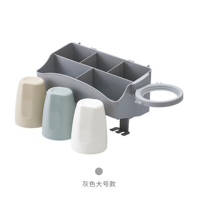 China Wall Mounted Bathroom Storage Holder Toothbrush Holder Home Decoration Punch Free Viable Hair Dryer Rack With Hooks for sale