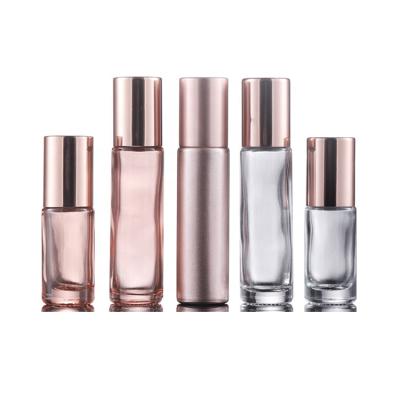 China Personal Care Essential Oil Use 10ml Pink Roll On Roller Perfume Glass Oil Bottles With Glass Stainless Steel Roller Ball Or for sale