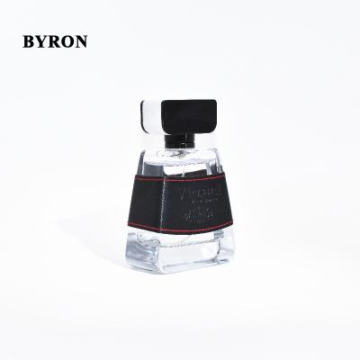 China New Arrival Personal Care 50ml Leather Decorated Luxury Triangle Dubai Glass Perfume Upscale Bottle for sale