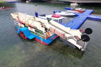 China Diesel Water Hyacinth Harvester Machine Vessel With 24 Cubic Meters Diesel Drive Gearbox Custom Building for sale