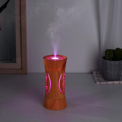 China Car Creative Style Hollow Out Wood Grain Design Logo Custom Humidifier 260ml Usb Portable Essential Oil Diffuser For Home Car Office for sale