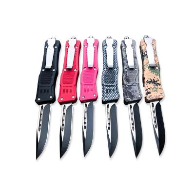 China Push Button Pocket Knife 420 Steel Multifunctional Pocket Knives Hunting Survival Outdoor Camping Knife With Light Handle for sale