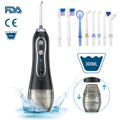 China 2021 New Arrival Portable Oral Irrigator Water Flosser 300ml Countertop Wireless Rechargeable Water Flosser For Family for sale