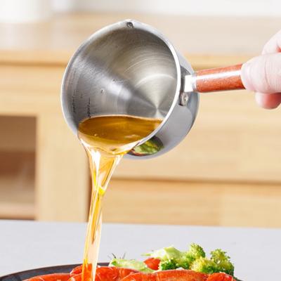 China Small Sustainable Sauce Pan Stainless Steel Butter Heater Stainless Steel Saucepan Pan For Boiling Milk Coffee Pasta With Wood Handle for sale