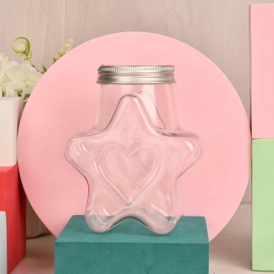 China Household products sell well new type unique design hot sale candy bottle star bottle star pentagon bottle for sale