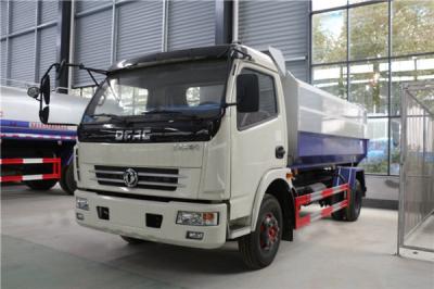 China Carga Lateral de Basura Acero de Carbono Dongfeng 4X2 8CBM Camión Compresor de Residuos en venta