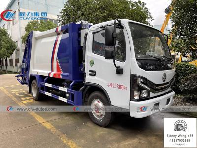 China Camión del compresor de la basura de la carga de la parte posterior de Dongfeng Duolica 4x2 6000L en venta