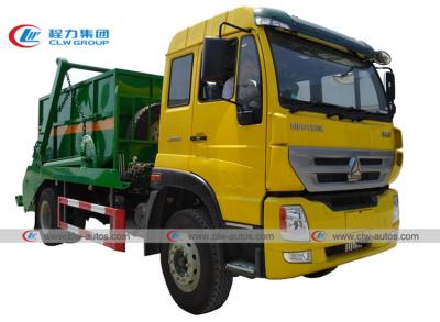 中国 Sinotruk Homan 4x2 10CBMのスキップの積込み機の振動腕のごみ収集車 販売のため