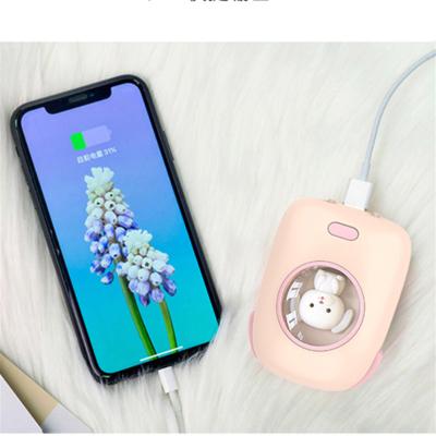 China 2022 Cute USB Electric Left Hand Warmer Power Charging Hand Warmer Hot New Products Online For Kids Rechargeable Hand Warmer Pocket for sale