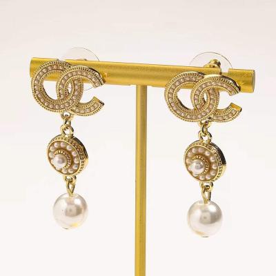 China Vintage Popular Women's Jewelry Ear Studs With Pearl Tassels Designer Ear Studs With Brand Letters for sale