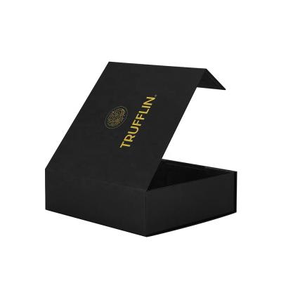 China Customized Luxury Foldable Black Magnetic Box Reused Material Design Gold Foil Logo Bottles Jars Packaging Paper Rigid Cardboard for sale