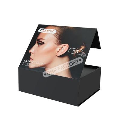 China Recycled Materials Wholesale Matte Black Magnetic Rigid Cardboard Luxury Cosmetic Packaging Paper Gift Factory Direct Box With Ribbon Handle for sale