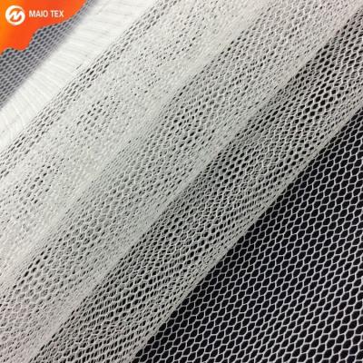 China 100%polyester hexagon mesh mosquito fancy embroidery anti-static net fabric for girls dress for sale