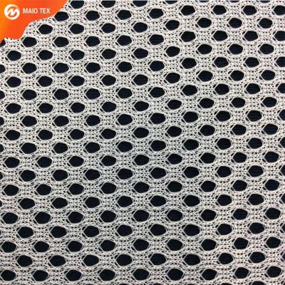 China Anti-Static Sportswear Striping 50D Open Hole Warp Knit 100% Polyester Mesh Fabric For Laundry Bag for sale