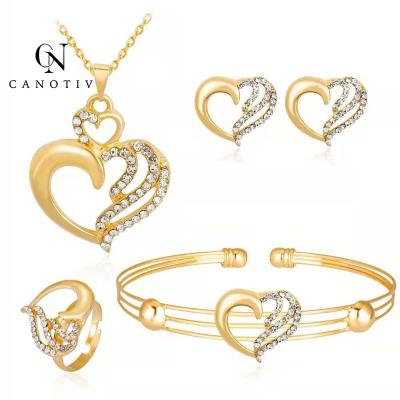 China Elegant Women Fashion Gold Heart Charm Bracelet Jewelry Party Accessories Necklace Heart Earrings Pendant Set for sale