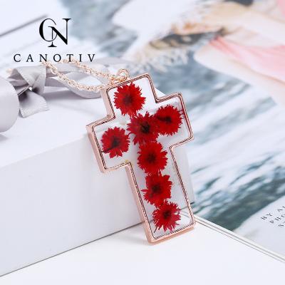 China Fashion Charms CANOTIV Shape Crystal Clear Resin Pressed Real Natural Dry Flower Rose Cross Necklace Jewelry for sale