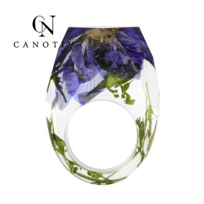 China Fashion High Quality Charms Custom Design Flower Transparent Ring Epoxy Resin Finger Rings For Ladies for sale