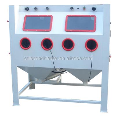 China COLO Turntable Double Work Station Scaling/Skinning Sandblasting Machine for sale