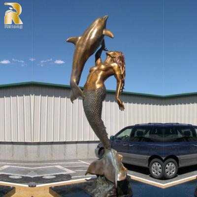 China Europe Seaside Modern Outdoor Decor Metal Mermaid Sculpture Bronze Standing Statue With Dolphin for sale