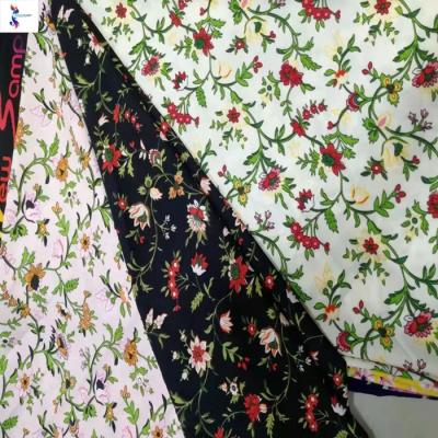 China New stocklot flower design twill print 100%polyester woven cloudy stocklot Tear-resistant fabric for make dress for sale