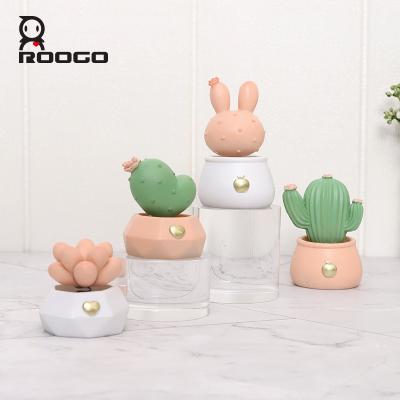 China Art Decor Roogo Creative Cactus Shaking Miniature Head Ornaments Figurine Crafts Gifts for sale